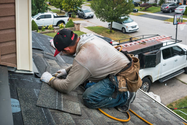 Professional Roof Replacement technician working in Harwood, MD